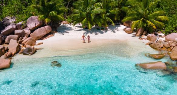 Couple on beach in the Seychelles