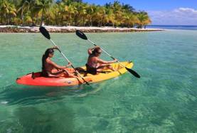 Two women kayaking in Belize